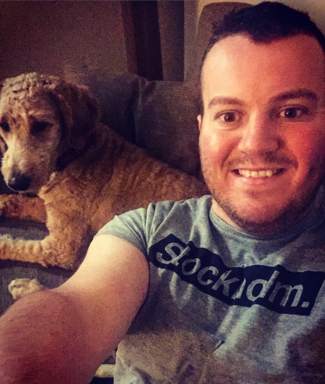 Nathan Strickland with his beloved Goldendoodle, Boston